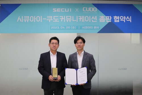 배영민 쿠도커뮤니케이션 부사장(좌), 김병문 시큐아이 네트워크 보안사업부장(우)